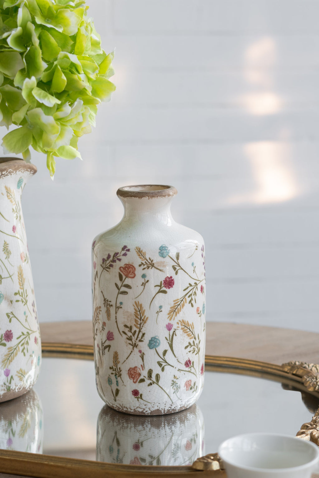 Ceramic Cylinder Vase with Multi-Colored Floral Motifs