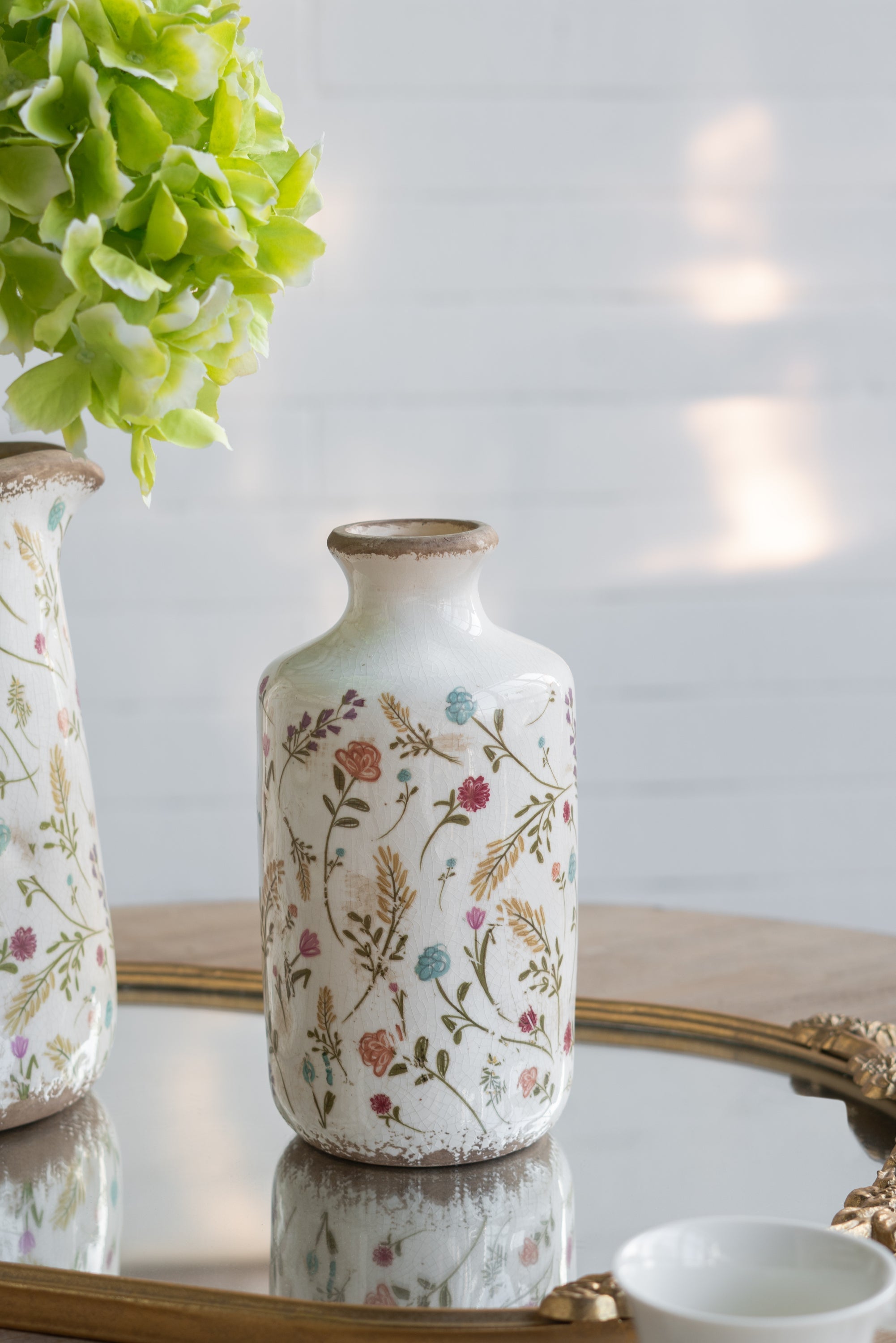 Ceramic Cylinder Vase with Multi-Colored Floral Motifs