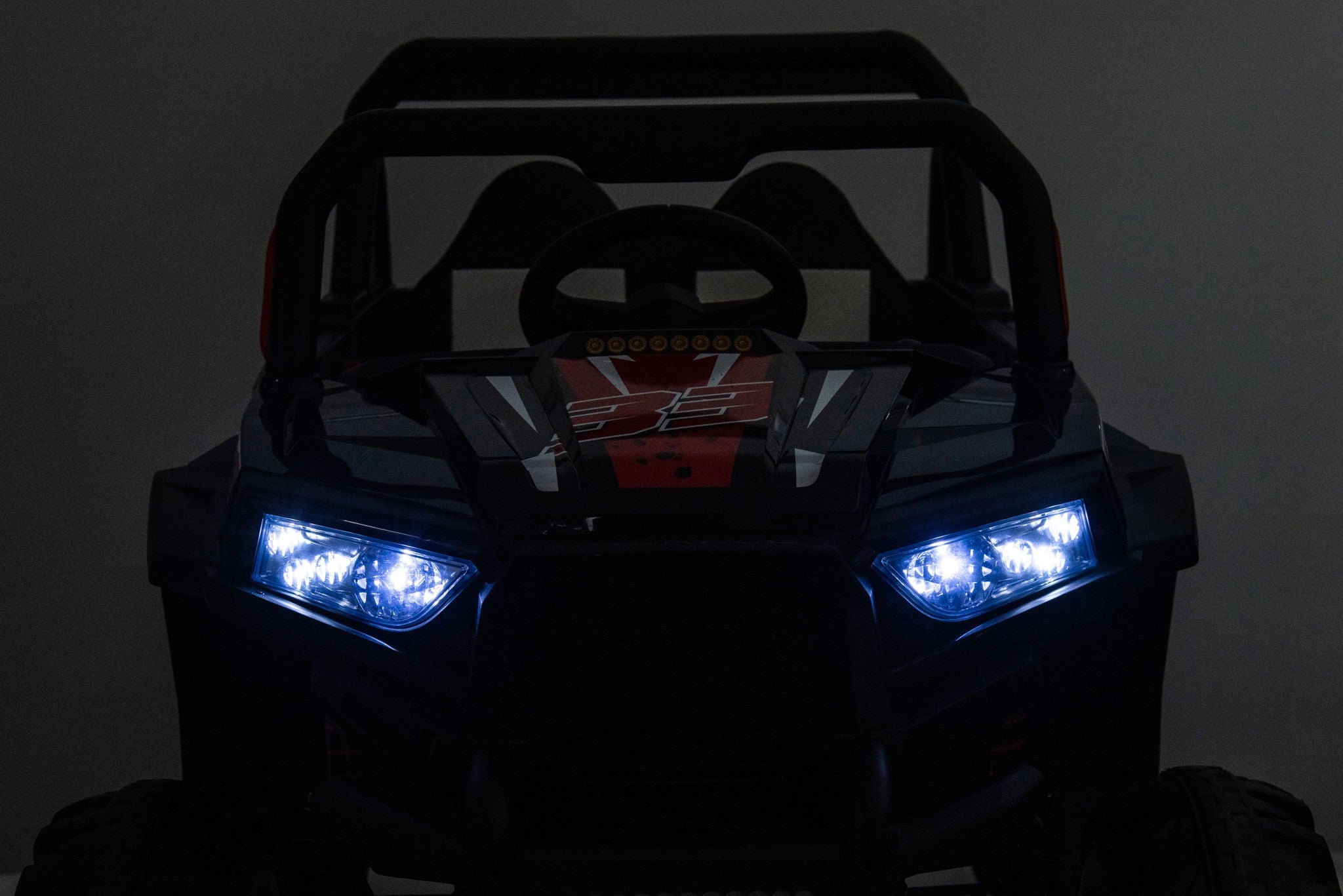 12V7A*1 30W*4 Four-Wheel Drive Seat One Button Start, Forward And Backward, High And Low Speed, Music, Front Light, Power Display, Two Doors Can Open, 2.4G R / C, Seat Belt Four Wheel Absorber